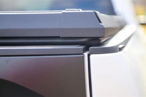 Dee Zee DZ 19550 Tonneau Cover Hard Folding Standard Profile F-150, Tundra and with or without RamBox Short Bed 5.7 Ft