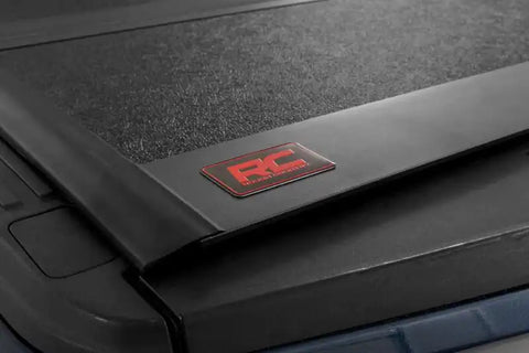 Rough Country 47220550 - Hard Tri-Fold Tonneau Bed Cover 5'7" Bed FORD F-150 (15-20)/Raptor (17-20)