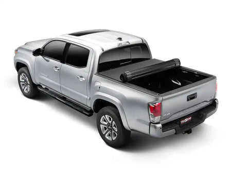Truxedo 1557116 - Tonneau Cover Sentry CT Hard Roll-Up Non Lockable Black Matte