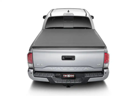 Truxedo 1557116 - Tonneau Cover Sentry CT Hard Roll-Up Non Lockable Black Matte