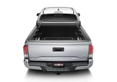 Truxedo 1557116 - Tonneau Cover Sentry CT Hard Roll-Up Non Lockable Black Matte