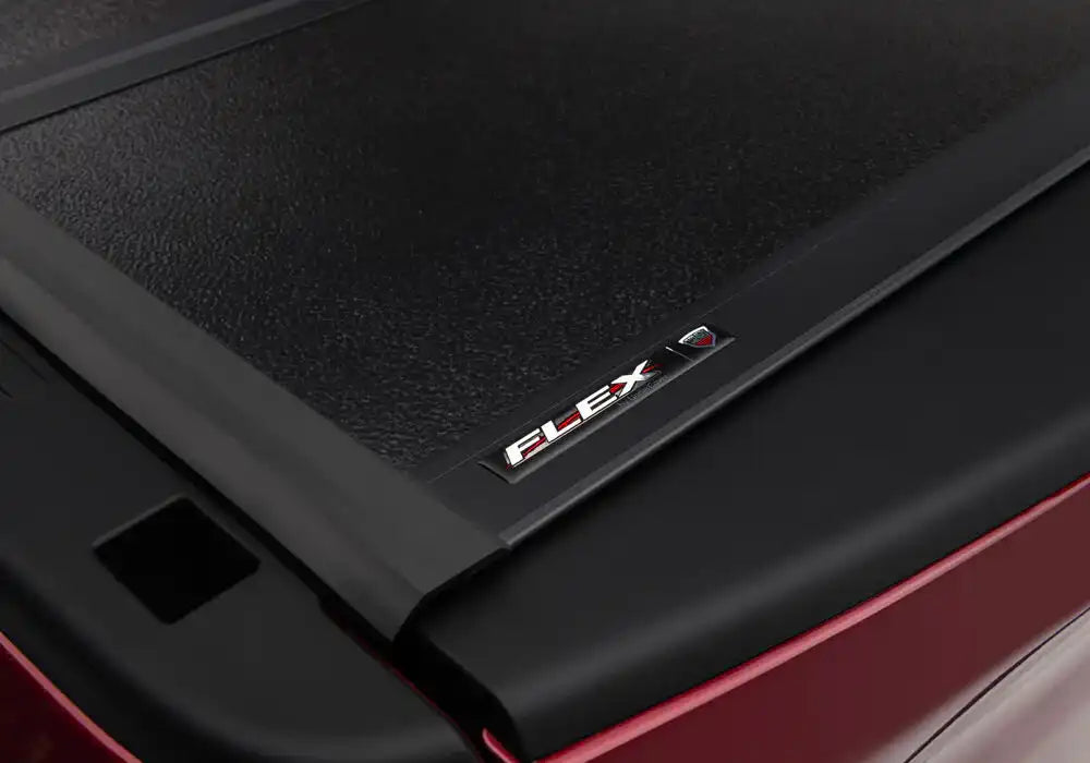 UC_Flex_Dodge-Ram-2019_Red_Details-06Badge.jpg