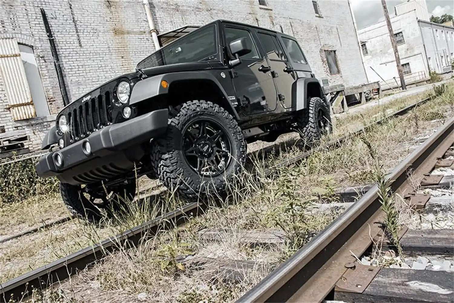 jeep-lift-kit_perf679-installed-tracks_1_3.jpg